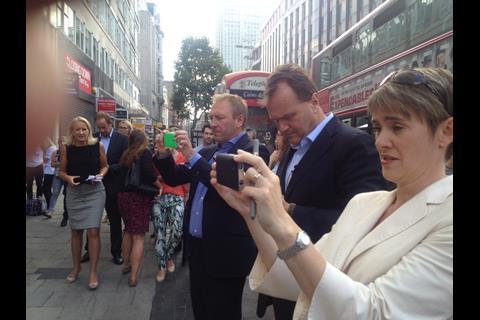 The rationale for the Dixons Carphone merger  - the rise of the smartphone - is crystallised in this picture of Andrew Harrison and Sebastian James taking pics of the shop on their mobiles